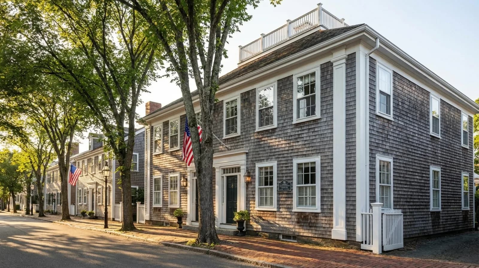 Historic Main Street Nantucket lined with Federal-era whaling captain homes and cobblestone streets